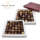 Zwei 36er Pralinenschachteln mit Trüffeln und Pralinen in Sternform