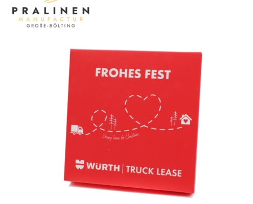 Geschlossene Pralinenschachtel mit der Botschaft „Frohes Fest“ und einer Illustration als Weihnachtsgeschenk der Firma „WÜRTH“