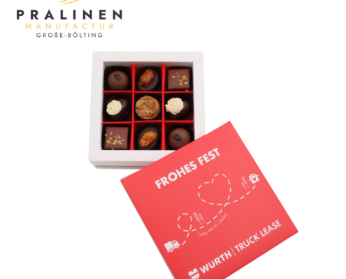 Individuelle Pralinenschachtel mit der Botschaft „Frohes Fest“ und einer Illustration als Weihnachtsgeschenk der Firma „WÜRTH“