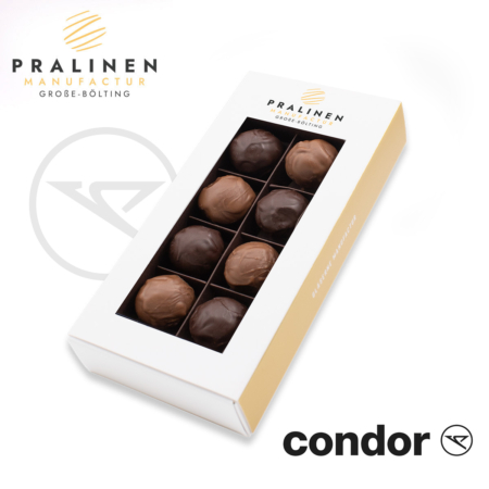 Pralinenschachtel mit 8 Pralinen, je 4 Salzkaramell- und je 4 Pralinen mit Pistazienfüllung